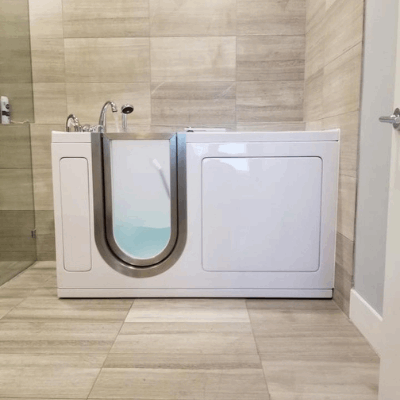 Walk-in bathtub with dual drain technology