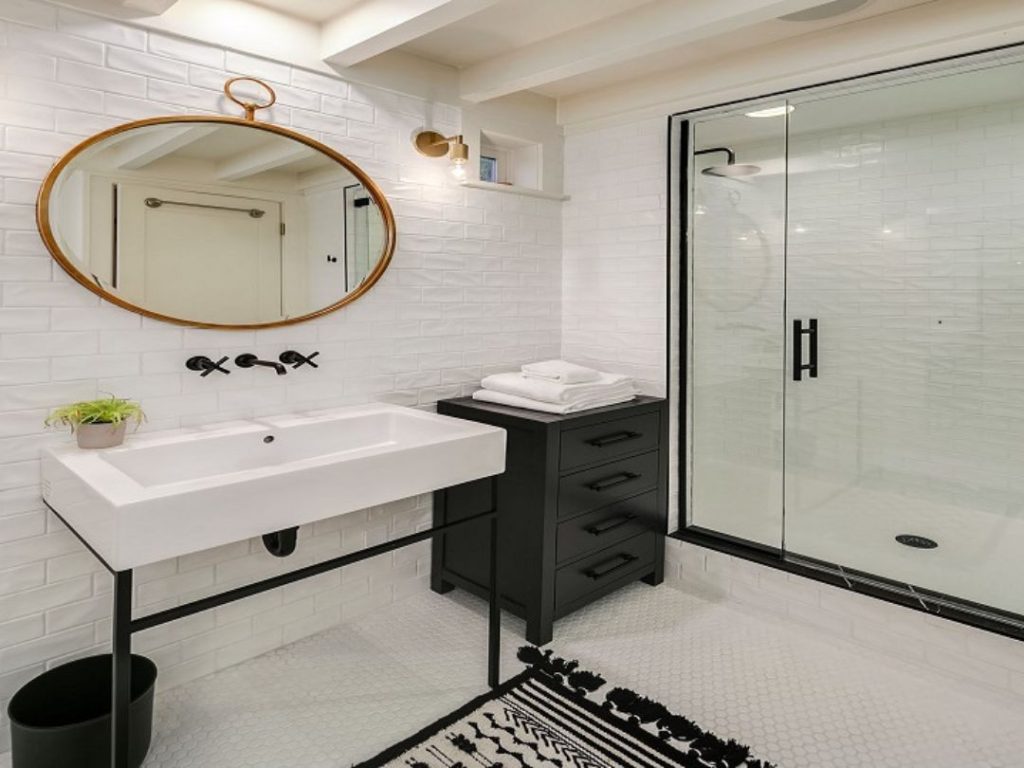 Safe walk-in tub with grab bars and seating