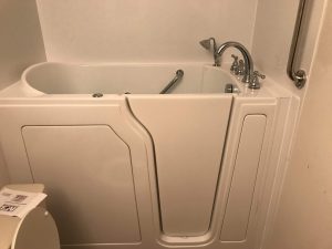 Walk-in tub installation process in home bathroom