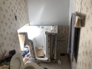 Deep soaking walk-in bathtub with spa functions