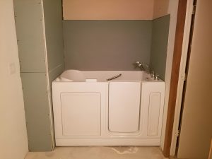 Tub insert installed over old bathtub