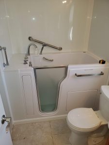 Bathroom remodel with new tub and shower surround
