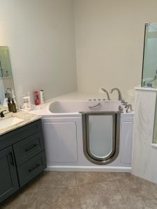 Full bathroom remodel featuring a walk-in tub