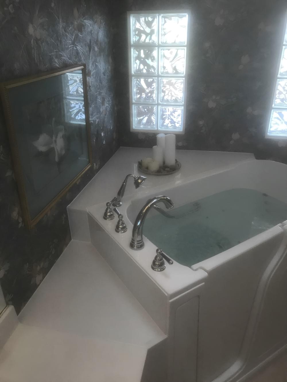 Compact walk-in tub with built-in seat and faucet